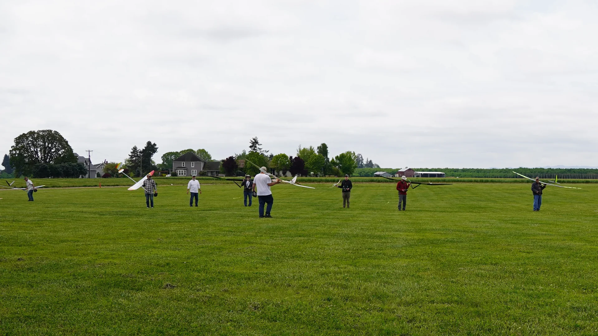PASS pilots lined up on the flight line — May 2026 ALES competition